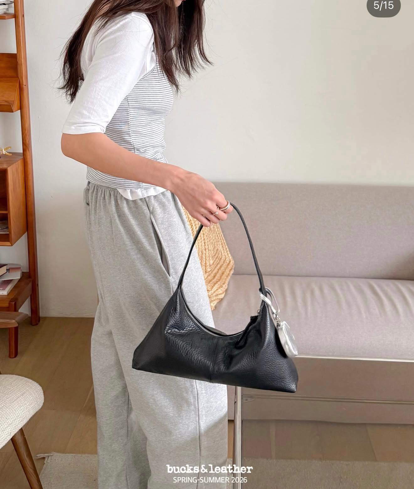 2fe5e995-d3ef-4832-ba48-3130a9ea0781 Grained Sleek Traingular Bag - Image 1