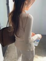 OUNCE Ruffle Rib Wrap Cardigan - Image 11